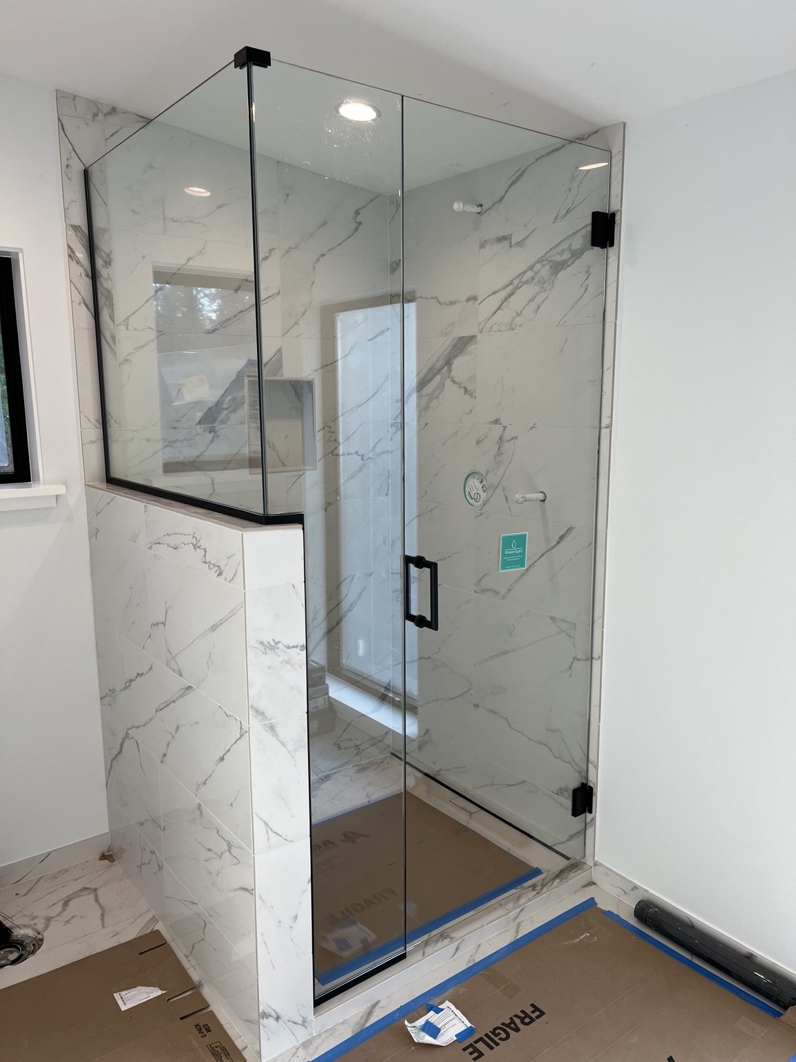 Custom shower enclosure by Simmons Glass